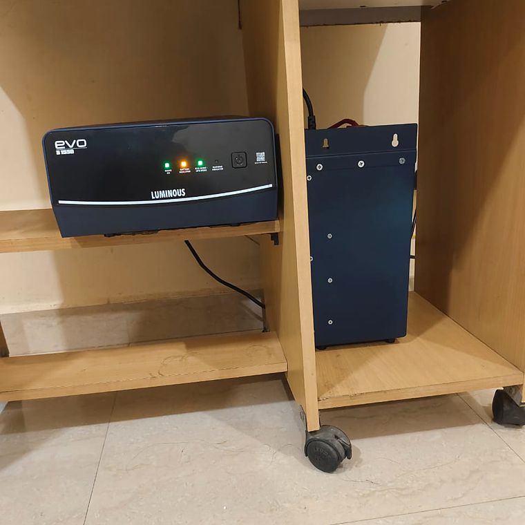 Home inverter and battery in a cabinet
